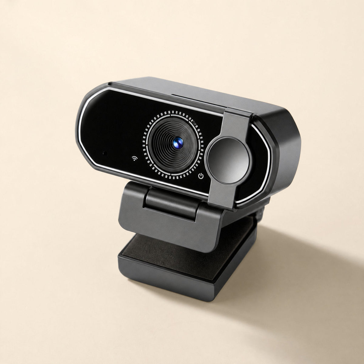 Voiceframe – Black webcam seen from a high angle, showing lens ring, microphone hole and sliding privacy cover