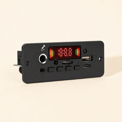 Ampcraft – Angled view of the black faceplate showing display, four buttons, microphone jack and card slot