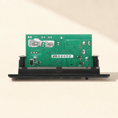 Ampcraft – Rear of the board showing green circuit board, solder pads and a row of connection pins