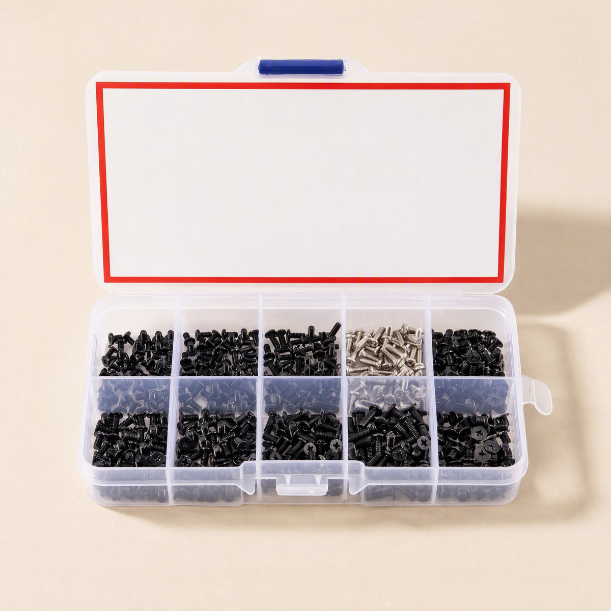 Flatfix Laptop Screw Kit with lid open above ten compartments of black and silver screws