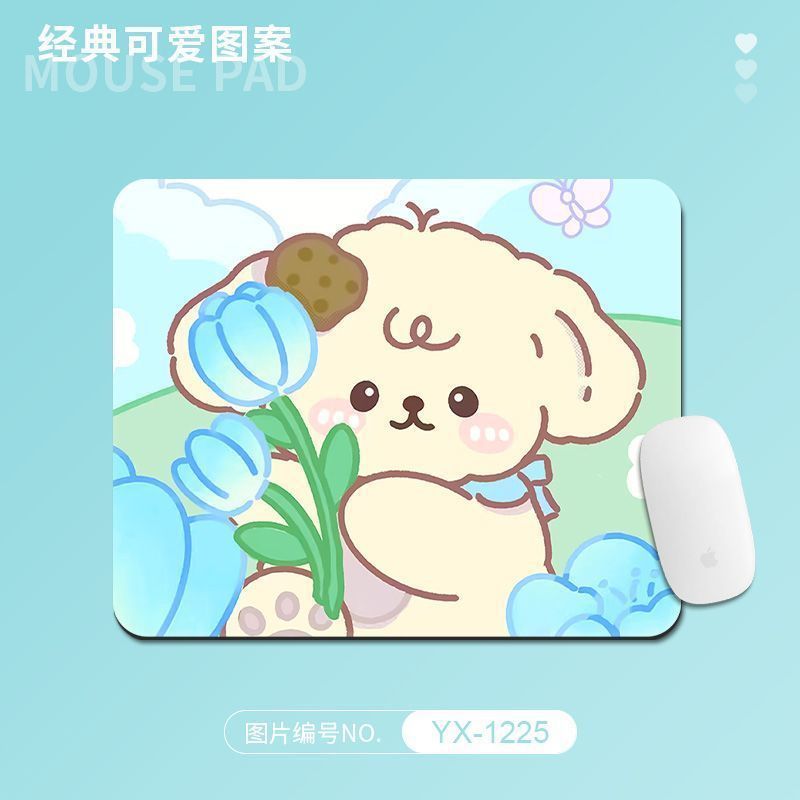 Toonpad Cartoon Desk Mat – mouse pad with a cream puppy holding a blue tulip on a pastel green hill, white mouse at right