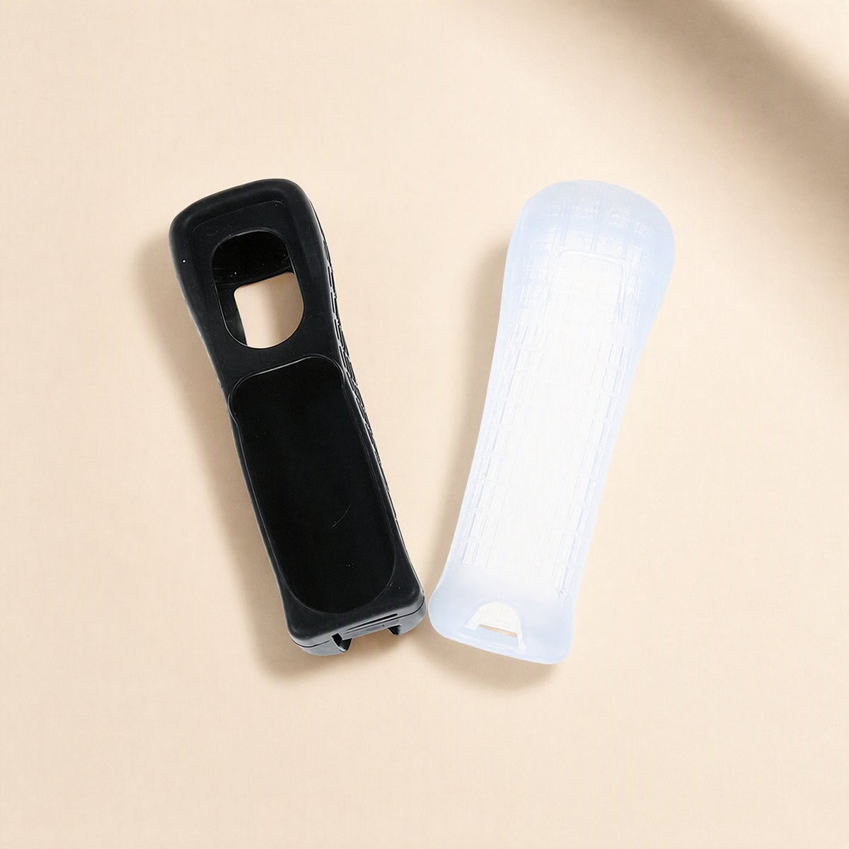 Gripguard – Inside view of black and clear silicone covers, showing the open back and bottom slot