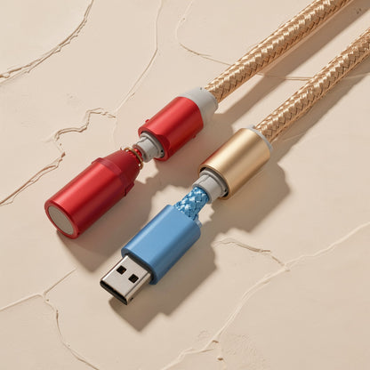 Magtrio – Red, gold and blue braided cables with metal connector heads shown apart, one with a USB-A plug