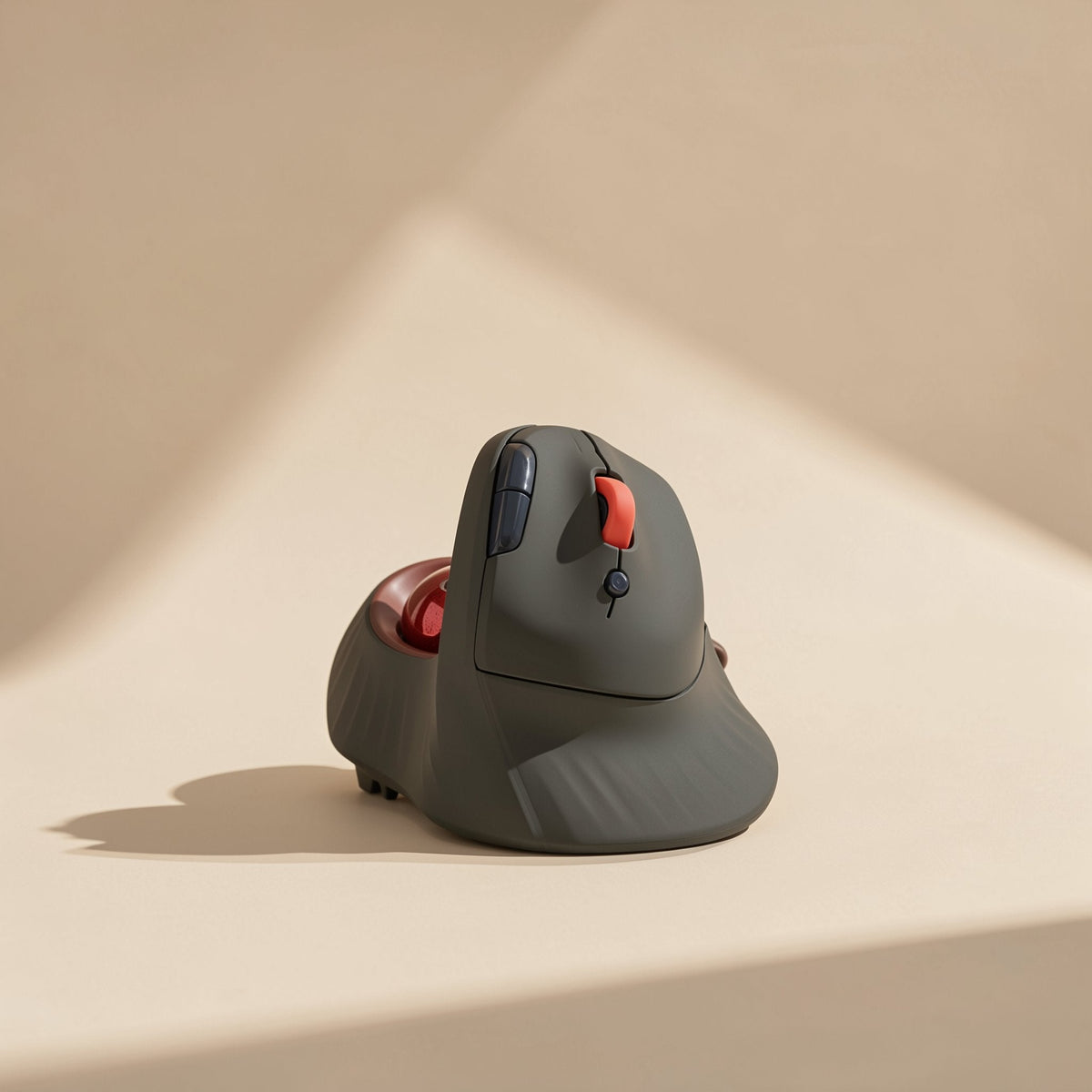 Blueloop – Rear angle of the vertical trackball mouse in dark grey, showing textured grip and red scroll wheel