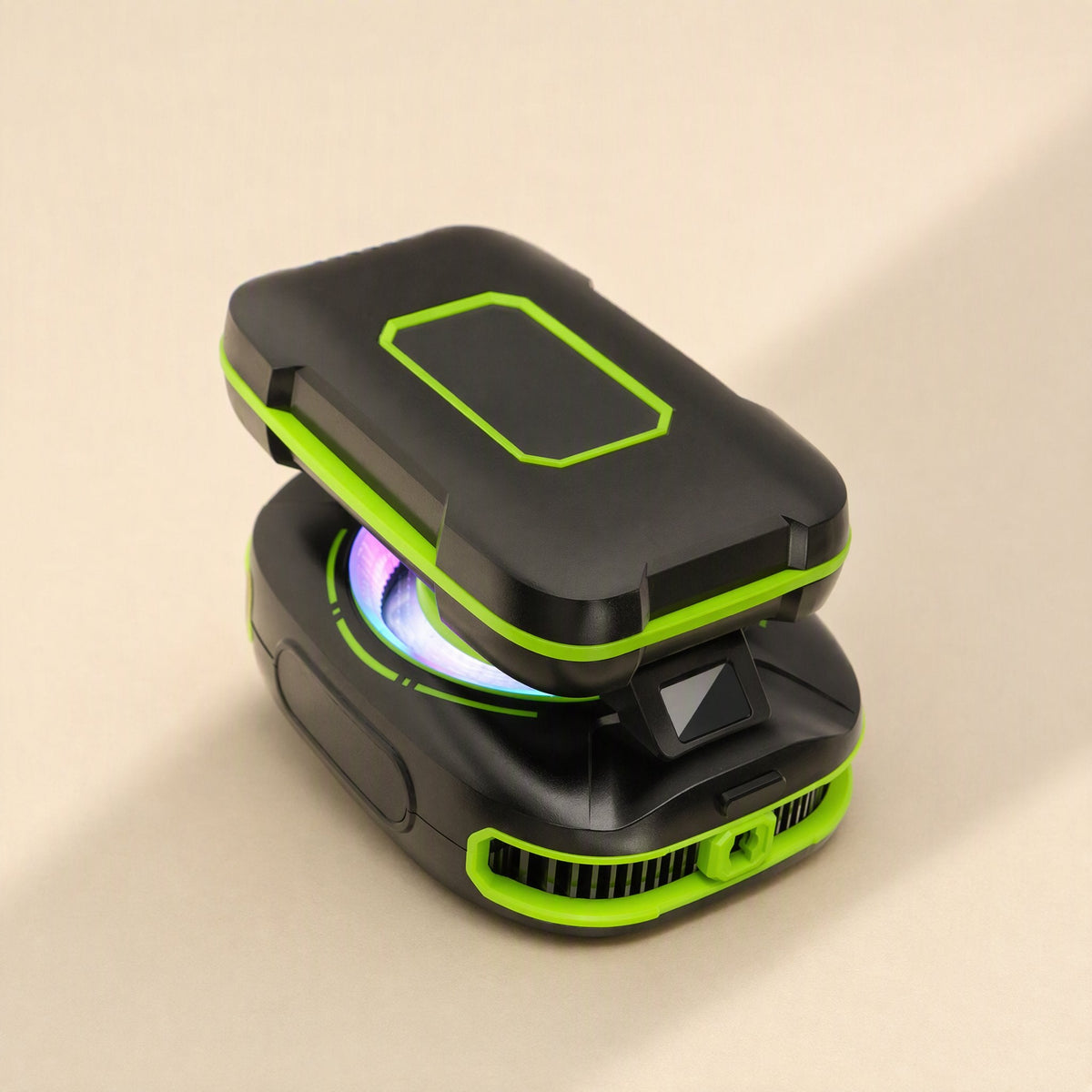 Chillcling – Compact black cooler with lime green trim, clamped shut, showing side vent slots and a glowing rim