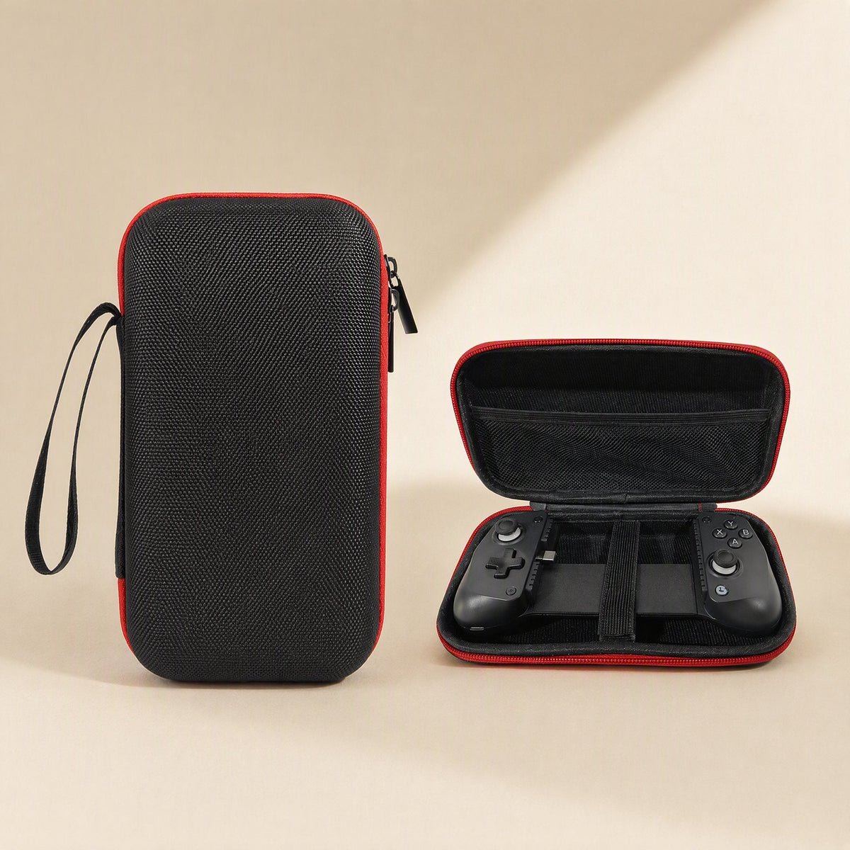 Padpouch Game Controller Storage Bag standing upright beside an open case holding a black mobile controller