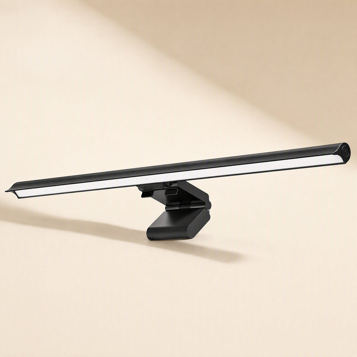 Hangglow Computer Screen Hanging Lamp, black LED bar with clip mount, angled front view on a cream background