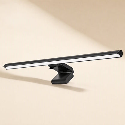 Hangglow Computer Screen Hanging Lamp, black LED bar with clip mount, angled front view on a cream background