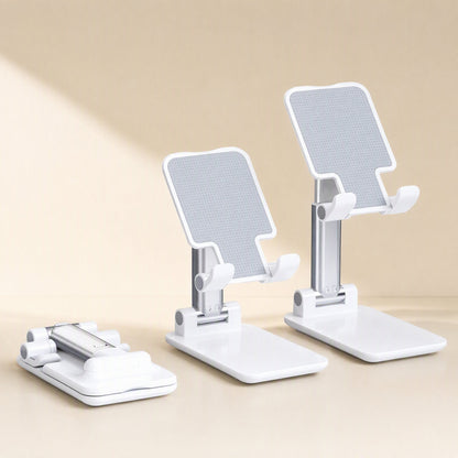 Foldangle Adjustable Folding Plastic Phone Stand shown open twice and folded flat, in white on a beige backdrop