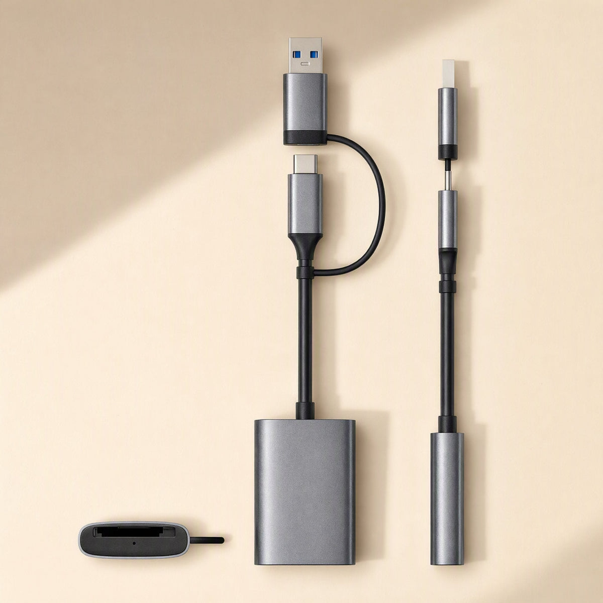 Flashread – Three gray card reader variants laid out together: dual-slot, single-slot and a USB-C cable version