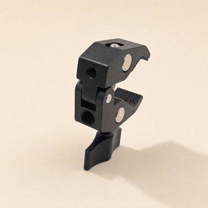 Streamclip – Clamp upside down, showing threaded mounting holes on the swivel joint and the knob below