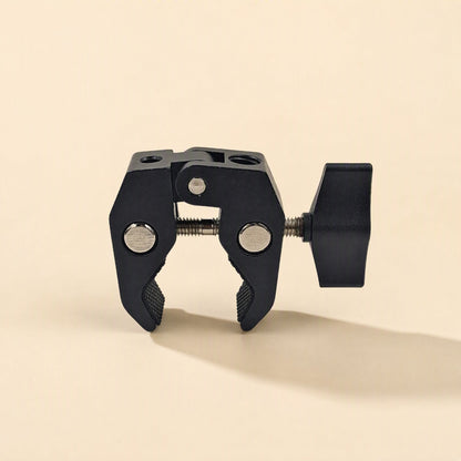 Streamclip – Front view of the black crab-claw clamp, jaws facing down and the wing knob on the right