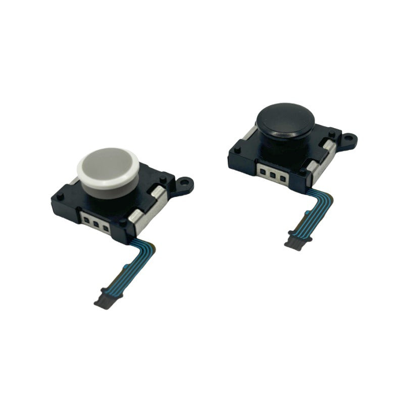 Pivotra – White and black joystick modules side by side at an angle, showing contact pads and flex cables