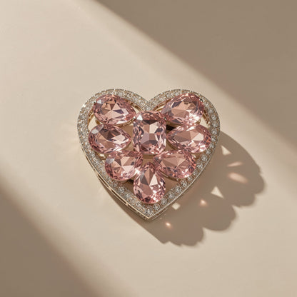 Cushgrip Magnetic Phone Airbag Holder – heart-shaped holder with pink crystals and a rhinestone border seen from above