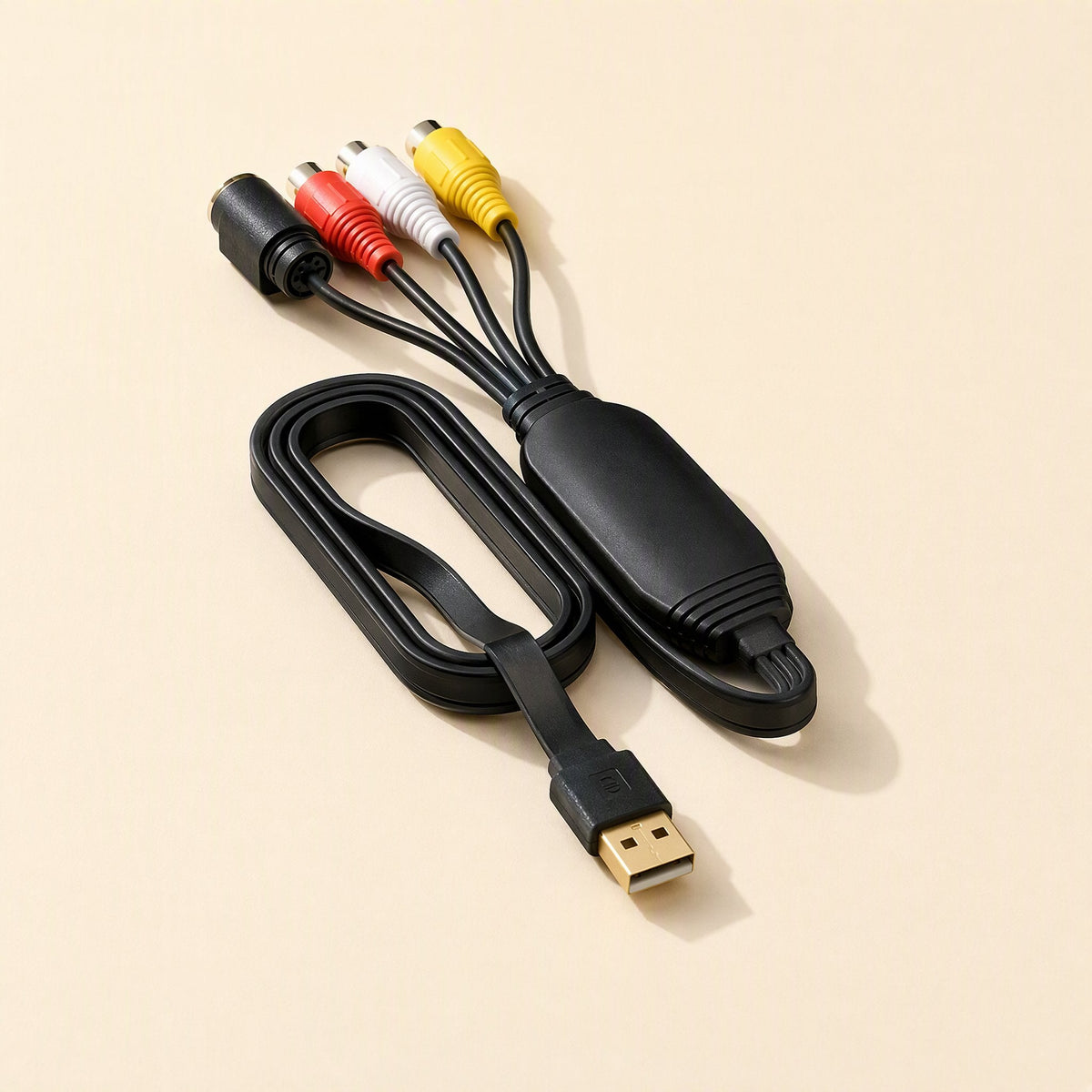 Tapeframe cable coiled in a loop, gold USB plug in front and RCA and S-Video ends at the back