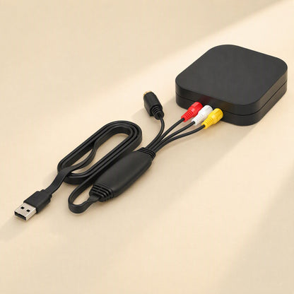 Tapeframe USB Capture Card – capture card plugged into a black media player box via red, white and yellow RCA plugs