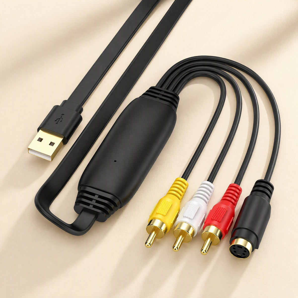 Tapeframe USB Capture Card – close-up of the black inline module with gold-plated USB plug and RCA and S-Video connectors