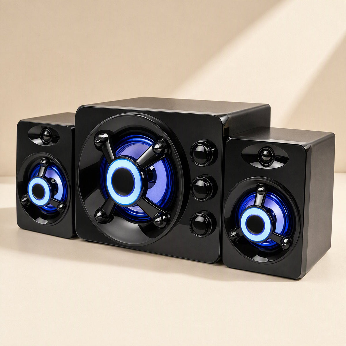 Tunespark USB Computer Mini Speaker set with two satellites and a center subwoofer glowing blue, angled view