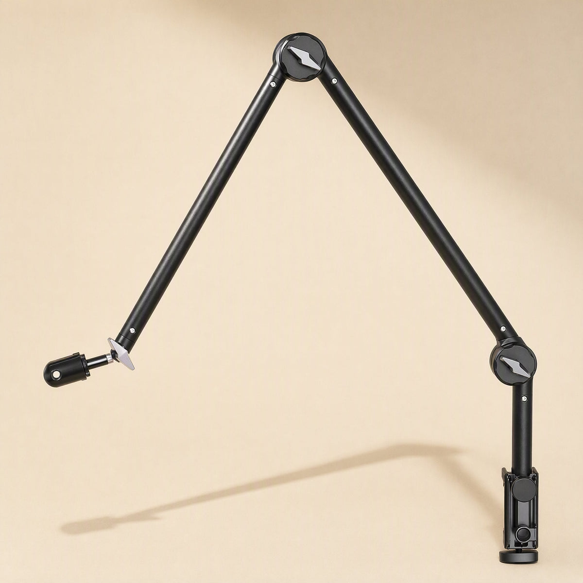 Metalreach – Black cantilever mic stand arm angled upward from a desk clamp, shown from the side with a bare mic mount
