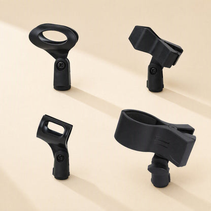 Joltclip – Four black plastic microphone clips in different shapes, including oval, open-frame and large spring-clamp styles