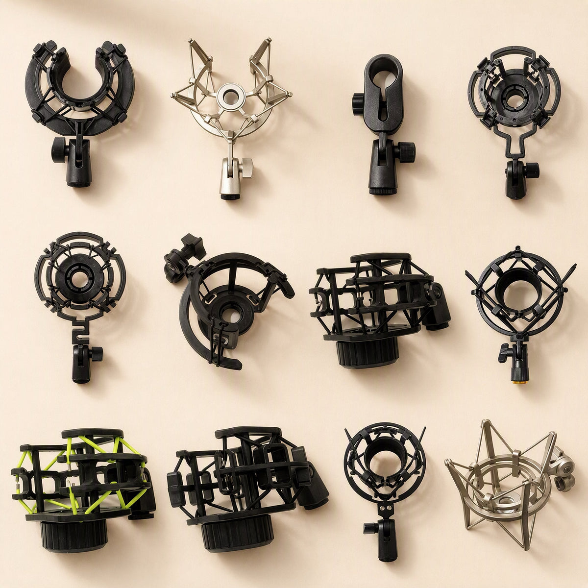 Joltclip – Overhead grid of twelve shock mounts, from round cradles to cage-style frames, on a cream surface