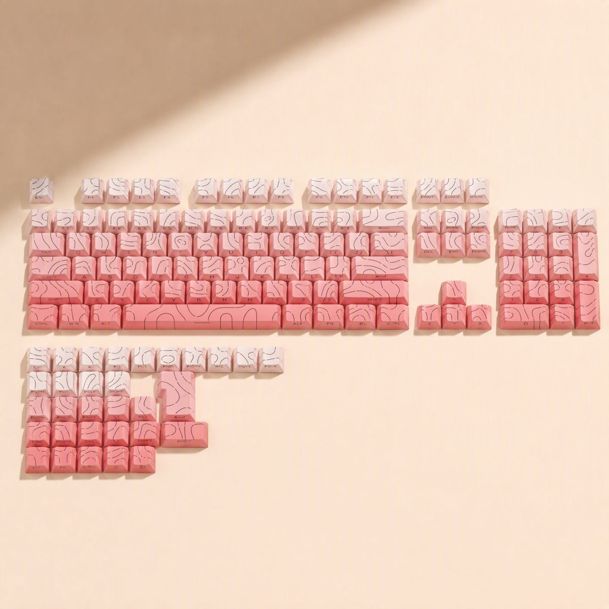 Sidescript – Pink and white keycap set with dark contour line patterns, shown as a full layout with numpad and extra keys