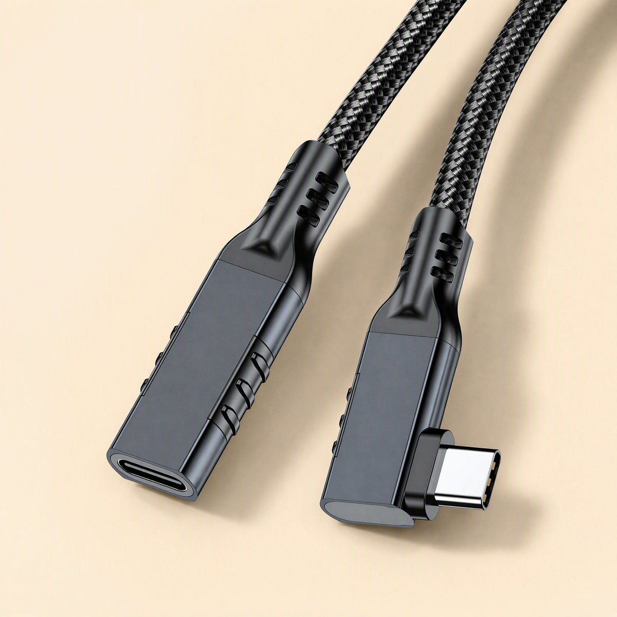 Elbowreach – Top view of black braided cable ends: flat female Type-C port beside the right-angled male Type-C plug