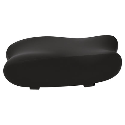 Comfycurve – Single black curved armrest pad shown from the side on a white background with two small tabs underneath