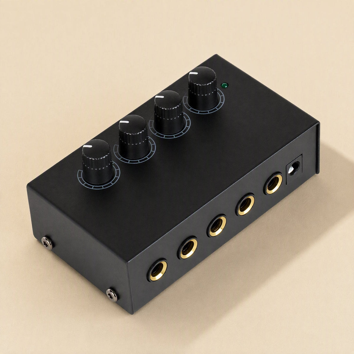 Ampwave – Black amplifier at an angle showing four knobs, green LED, front gold headphone jacks and power port