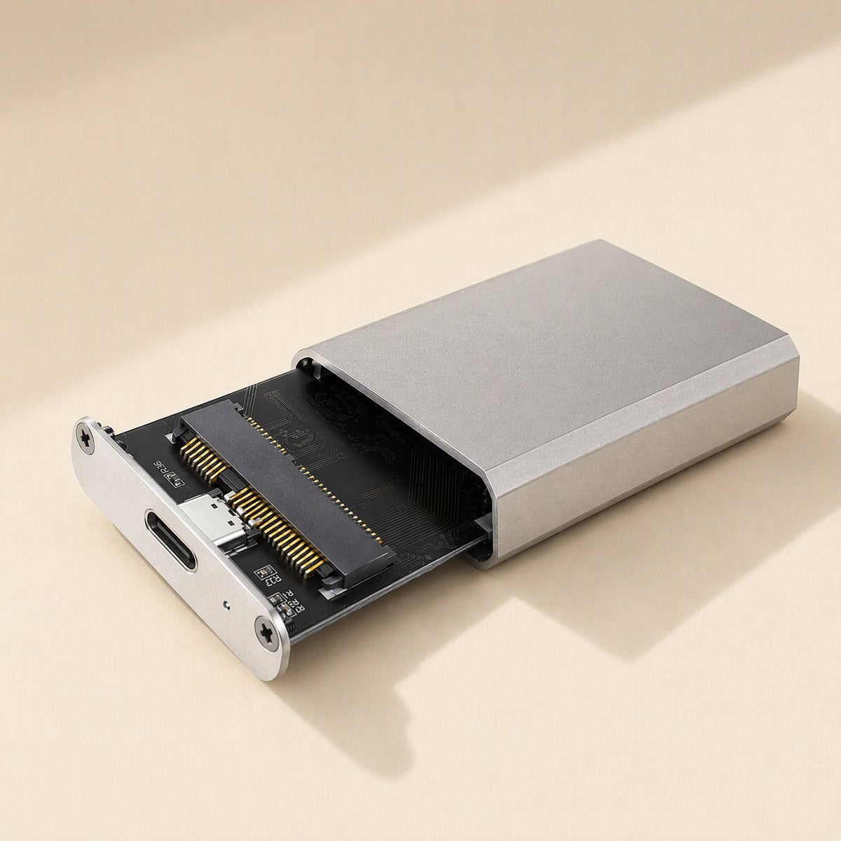 Bytehusk enclosure with end panel slid out, exposing the circuit board, mSATA connector and USB-C port