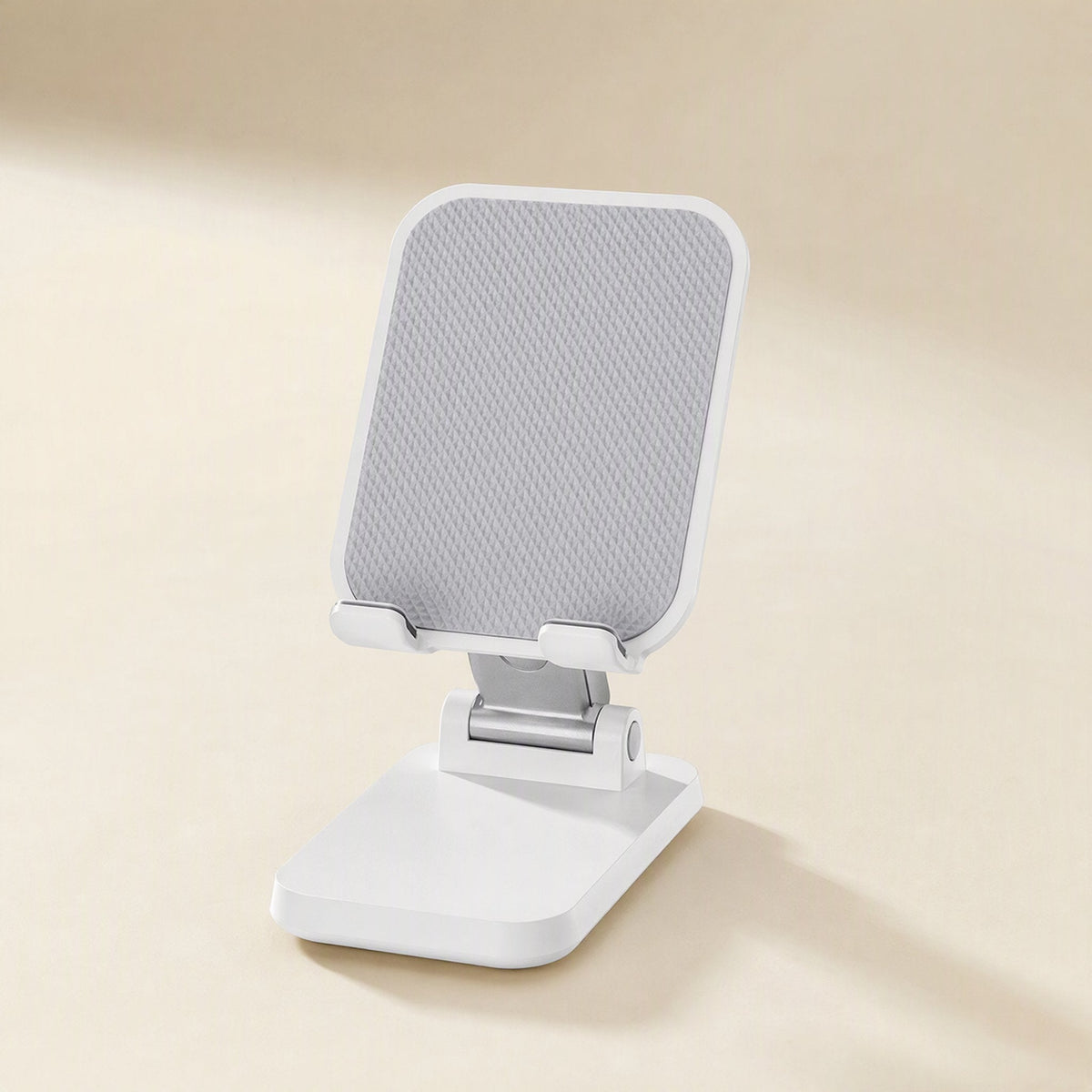 Phonecove Desktop Phone Holder – white folding phone stand with grey textured back plate, front view on a cream background