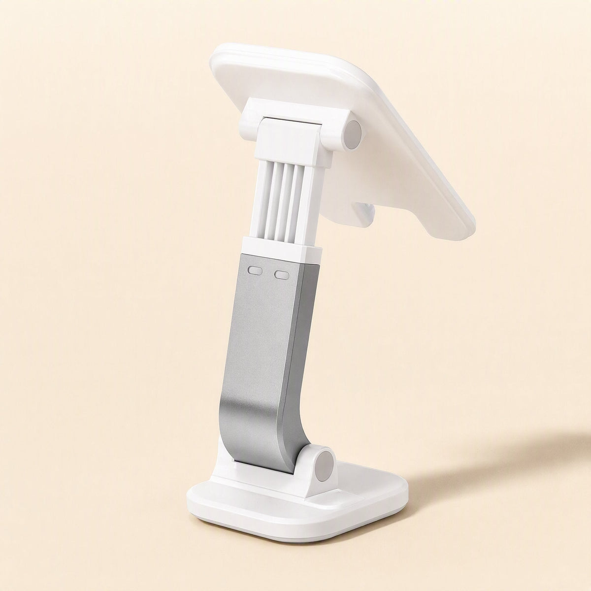 Phonecove – Rear view of the stand extended, with silver metal hinge arm, ribbed white back and round base joint
