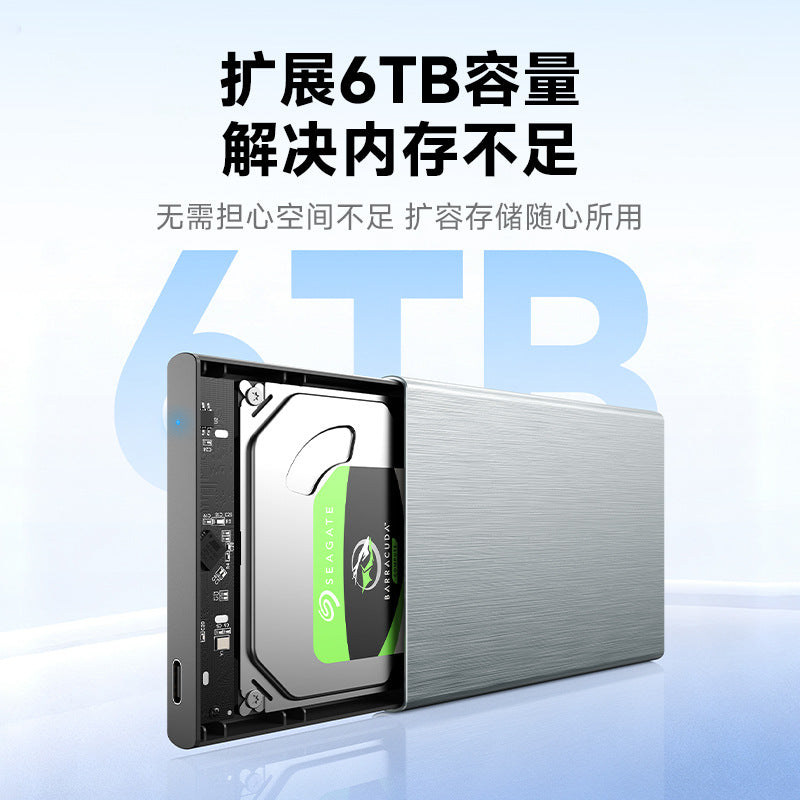 Alumacase – Drive enclosure opened to show a Seagate hard drive inside, with a USB-C port and the text 6TB
