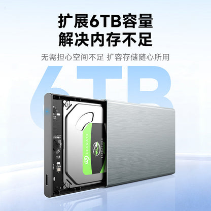 Alumacase – Drive enclosure opened to show a Seagate hard drive inside, with a USB-C port and the text 6TB