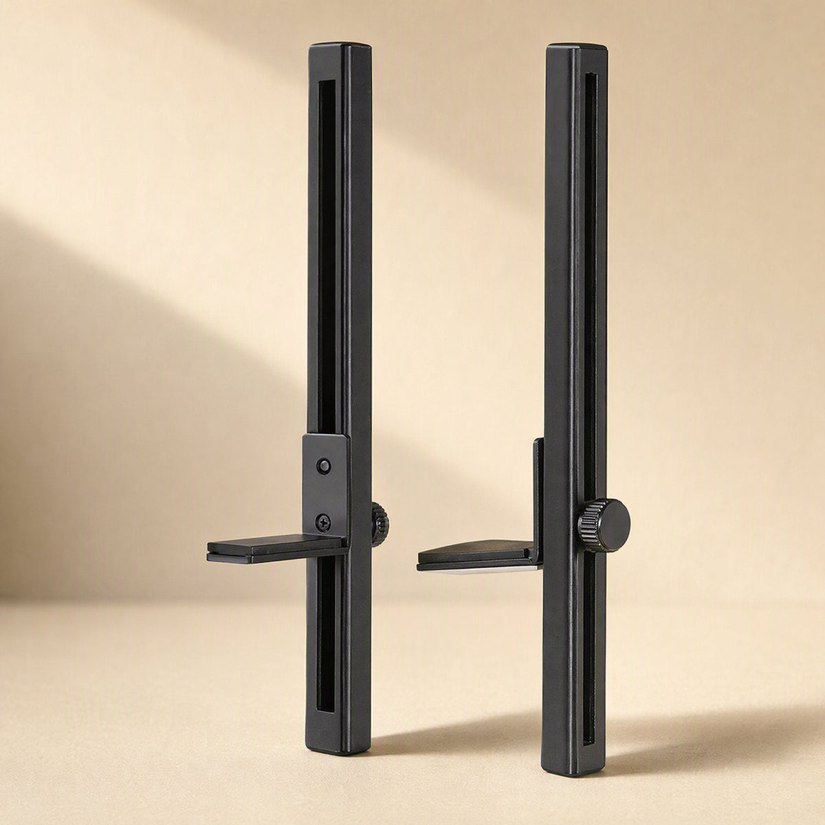 Chipstand – Two black graphics card brackets with slotted vertical posts and adjustable support arms with thumb screws