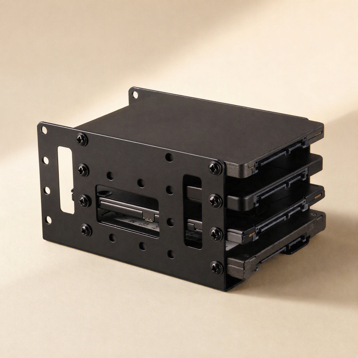 Bayrise – Four 2.5 inch drives mounted in a black bracket, front angle showing screws and cutouts