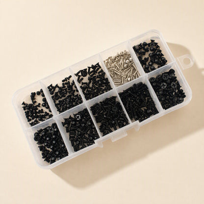 Sinkfast – Angled view of the open organizer box showing black and silver laptop screws in separate sections