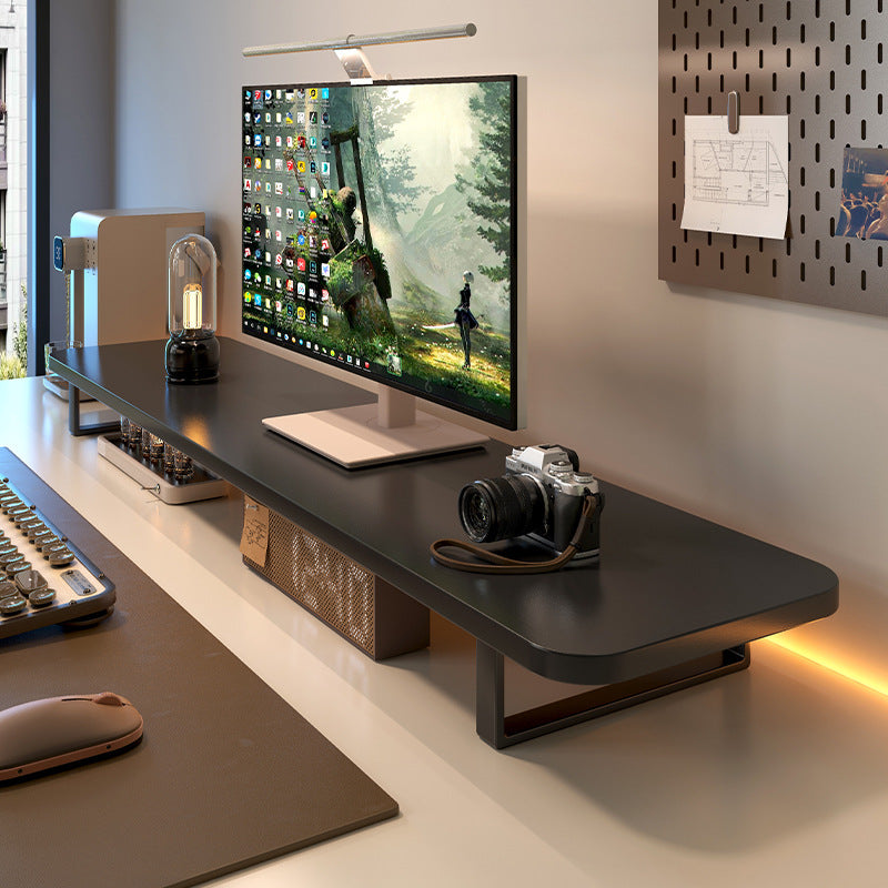 Deskloft – Black monitor stand desk organizer with a monitor, camera and warm backlight on a tidy desk