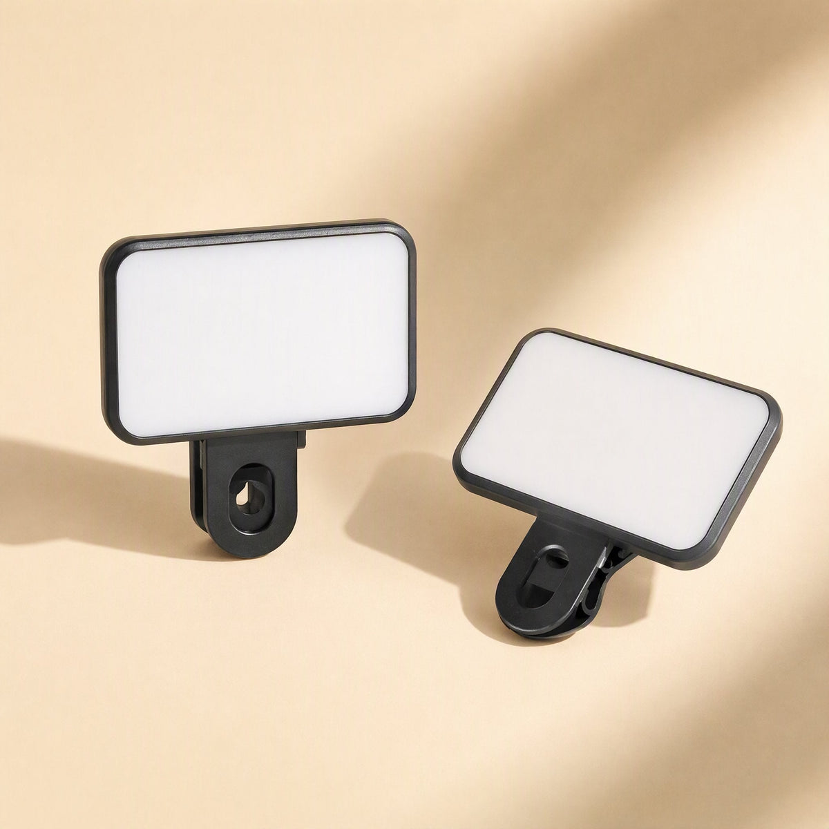 Snapshine – Two black rectangular fill lights side by side, one with the clip facing front and one angled sideways