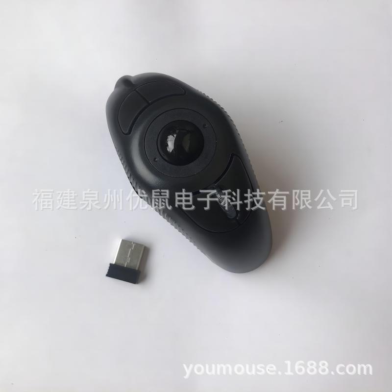 Trackorbit 2.4G wireless trackball mouse in black from above, with its small USB receiver beside it