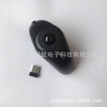 Trackorbit 2.4G wireless trackball mouse in black from above, with its small USB receiver beside it