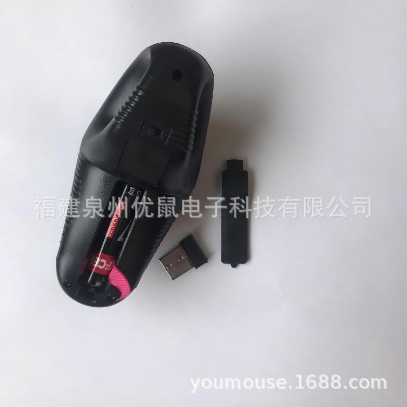 Trackorbit – Underside of the mouse with the battery cover removed, showing an AA battery, the receiver and the cover