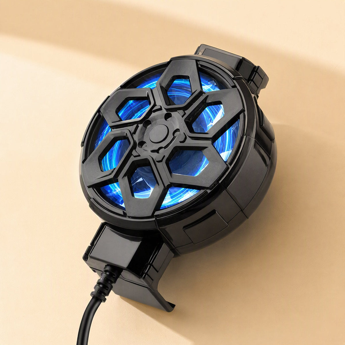Frostclip – Black radiator clip with blue LED fan and hexagonal grille, cable running down from the bottom clip