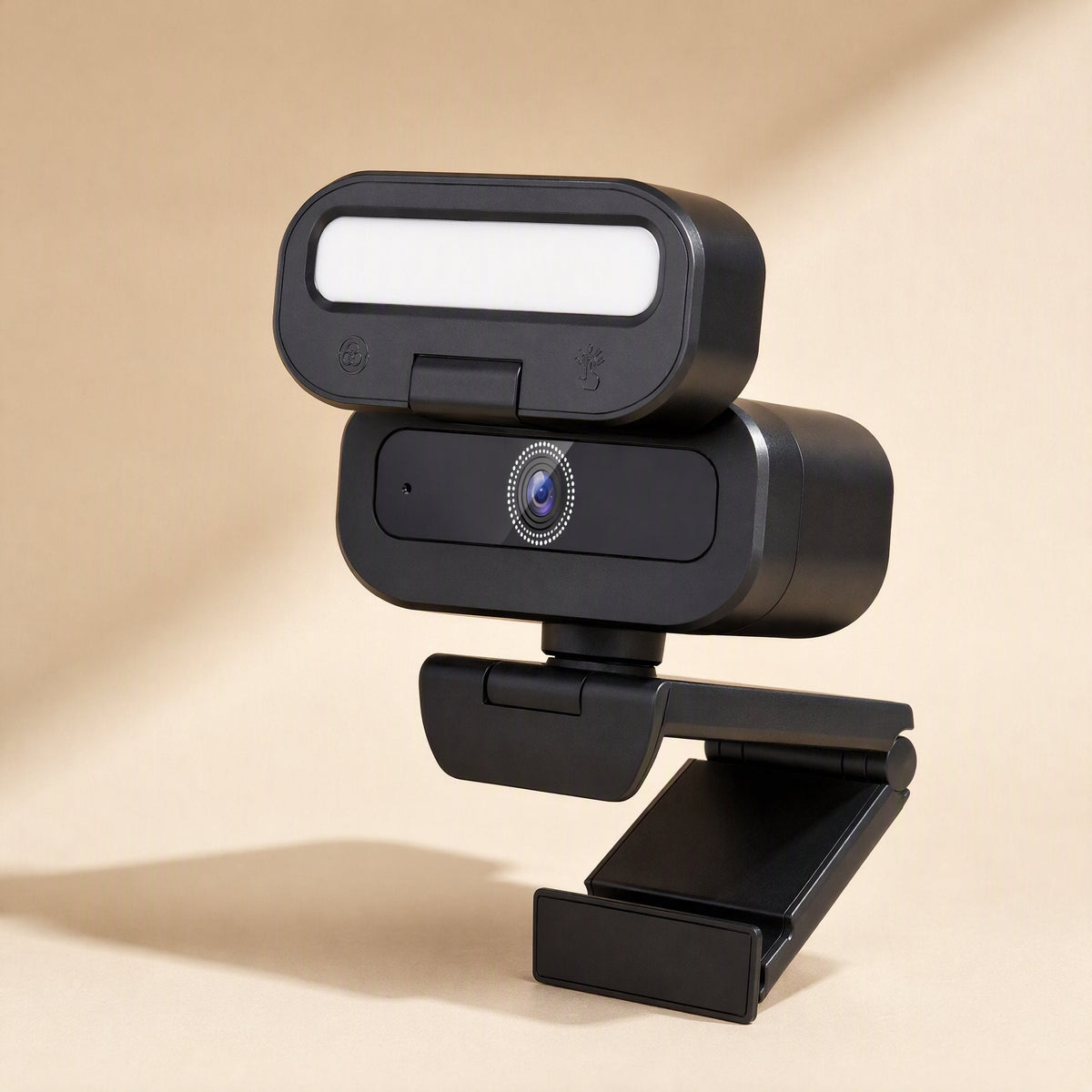 Focussnap USB Computer Camera with illuminated fill light on top, shown on a beige background