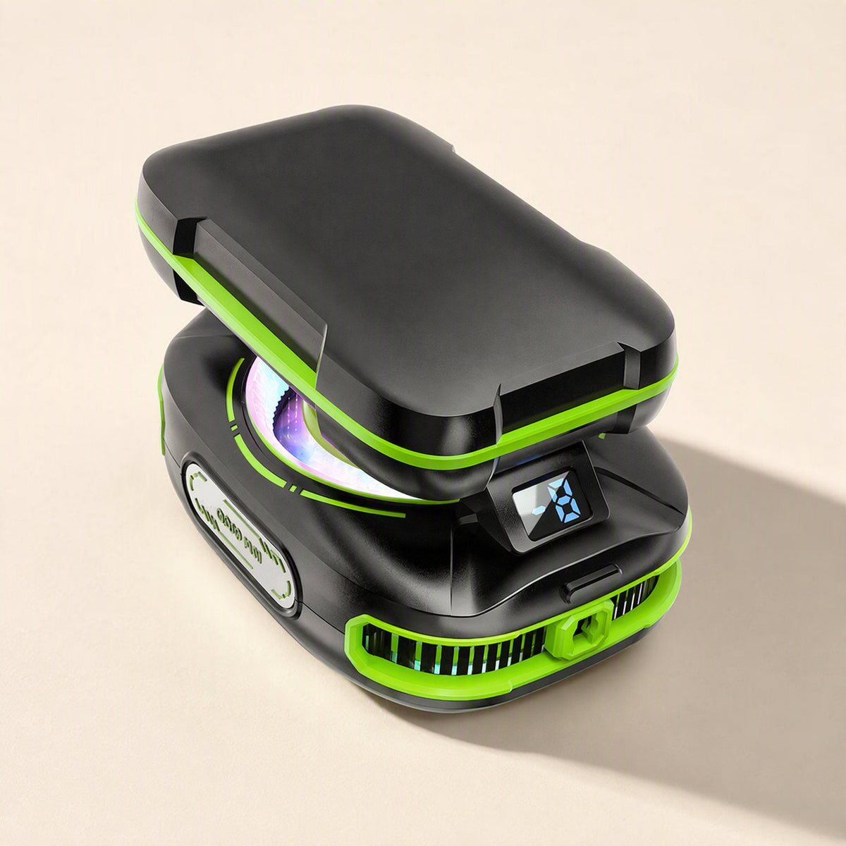 Coolcore Mobile Phone Radiator with Digital Display, black and green, shown from above with a small temperature screen