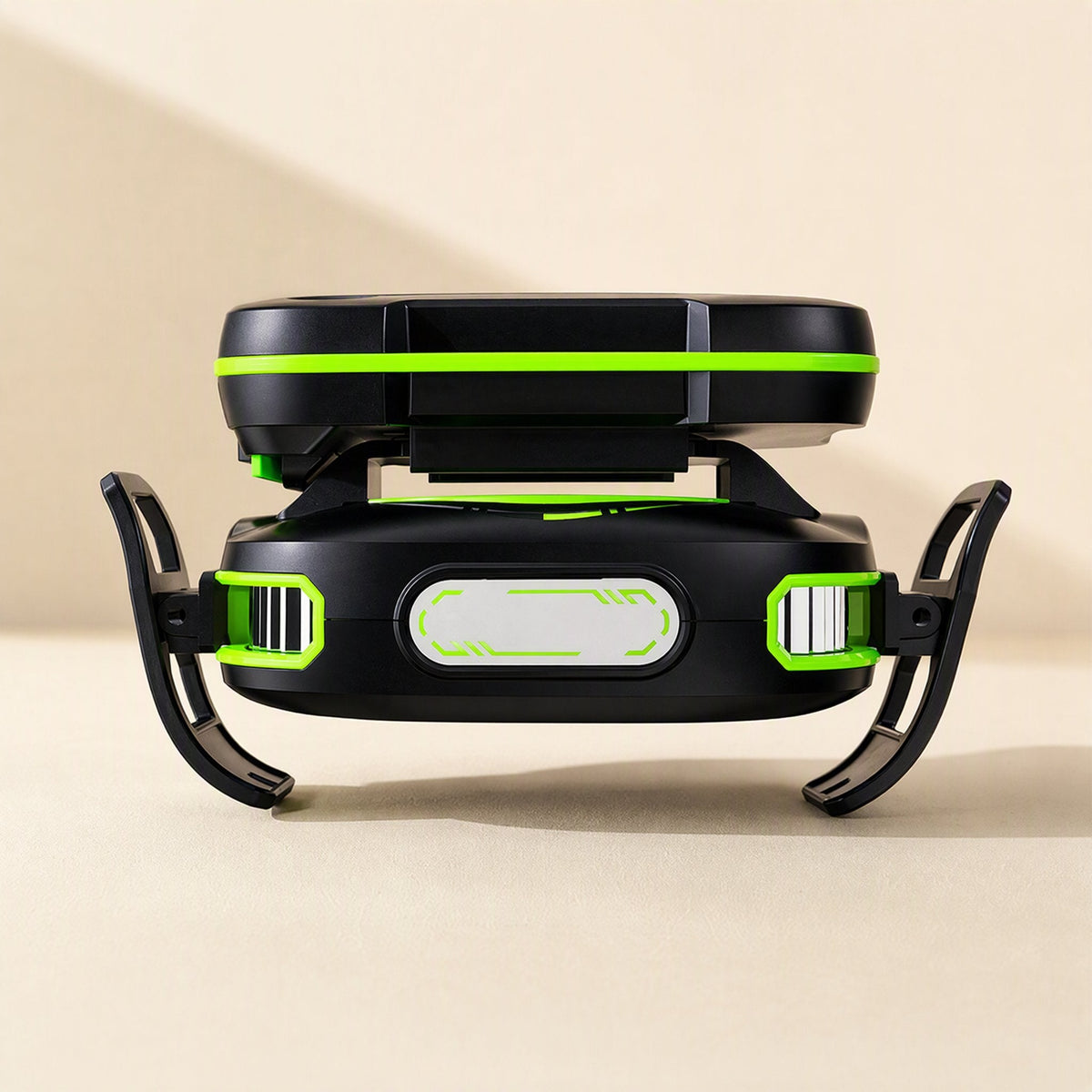 Coolcore – Front view of the cooler with two curved clip arms extended and green-framed vents on each side