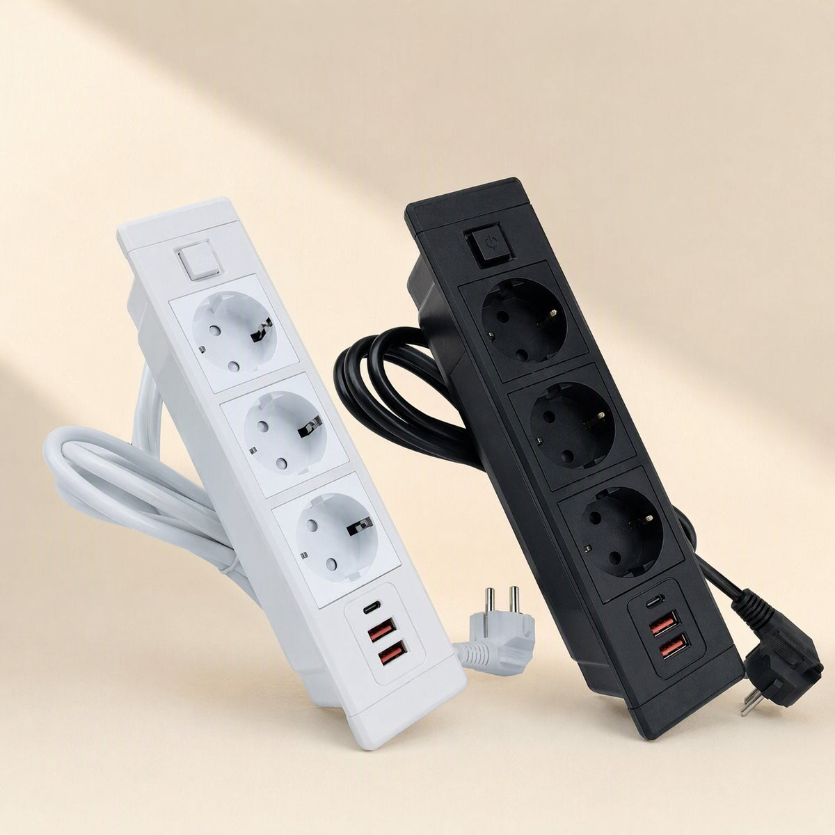 Plugnest – Three-socket white and black desktop sockets standing upright with cords and European plugs visible