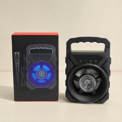 Roamsound – Speaker beside its retail box showing a blue glowing speaker and microphone illustration