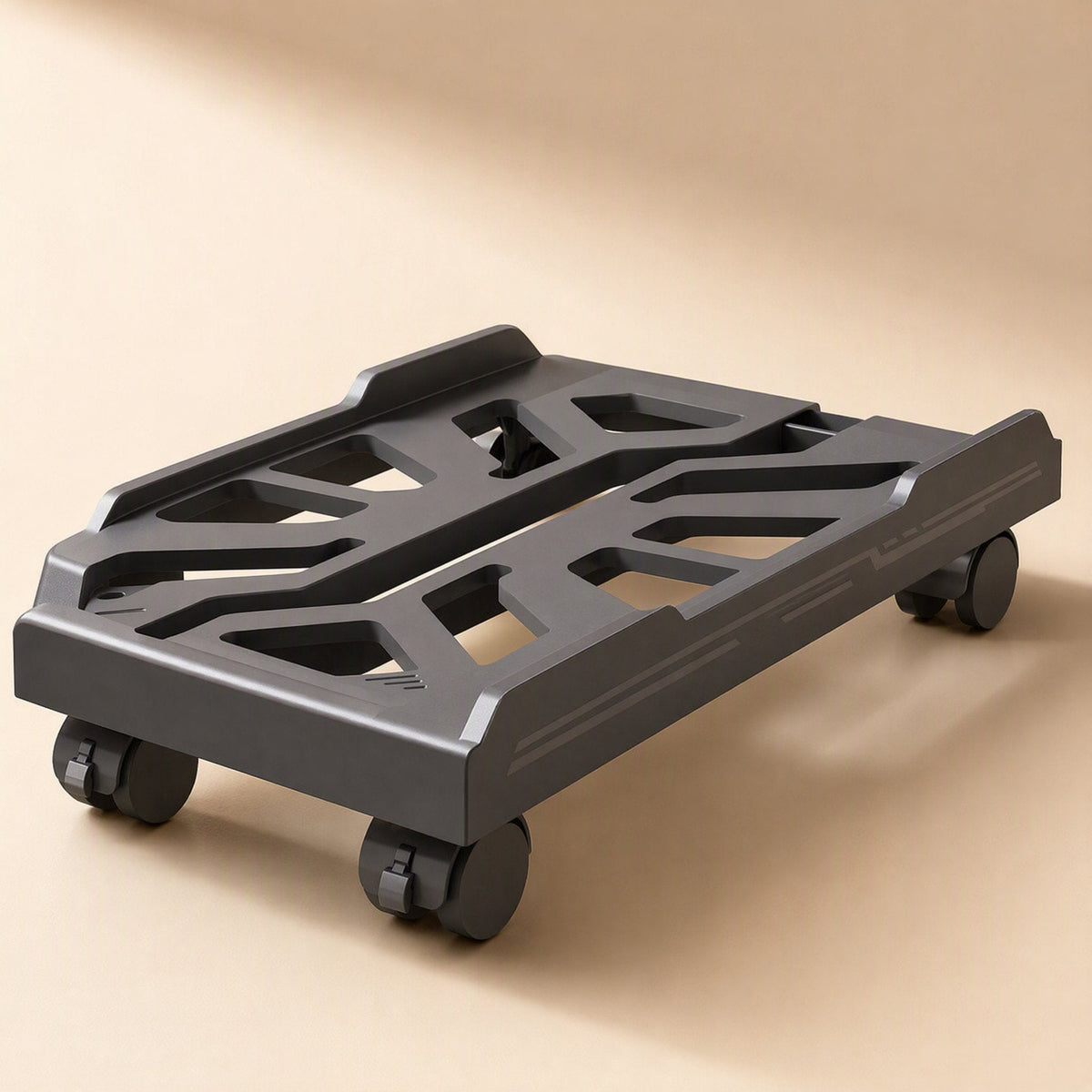 Towerperch Computer Host Stand – black stand with hollow geometric cutouts and four wheels, seen from a low front corner