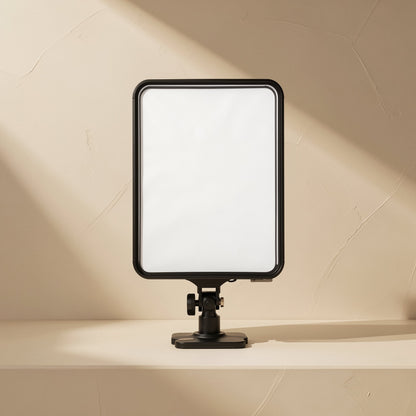 Facegleam – Single black-framed LED panel with white diffuser on a compact tabletop base, front view
